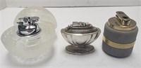 Three vintage designer lighters. Glass golf ball