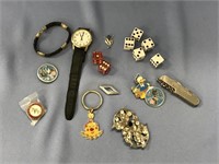 Lot of; 8 pcs of dice, enamel pins, a Timex watch