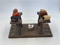 Wooden pipe stand with six pipes, two corn cob