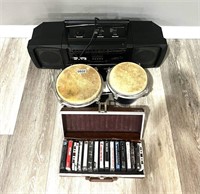 Boom box, set of bongo drums and tapes.