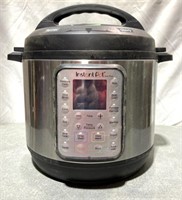 Instant Pot Electric Pressure Cooker (pre-owned,