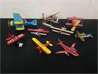 Collectible metal and wooden and glass airplanes