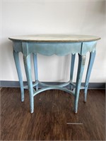 Blue entry table with gold tone accents and