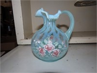 Fenton glass hand painted pitcher.