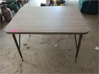 Table with metal legs 30x42x30