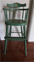 Antique child’s high chair in green paint 33”