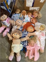 2 Boxes of dolls including Cabbage patch dolls