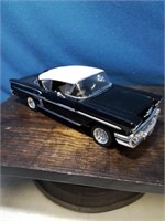 1958 black chevy impala co-op with white top
