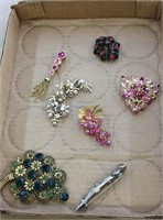 7 brooches