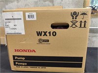 Brand new red Honda pump