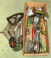 vintage kitchen utensils, cast iron trivet, etc.