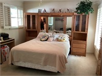 Queen size bed with storage unit
