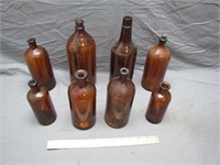 Lot of Antique 8 Brown Glass Bottles