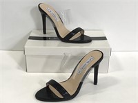 Pair of black strap Unilady heels