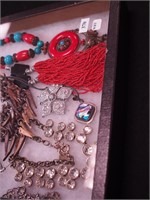 Container of costume jewelry: Mindy Mae's