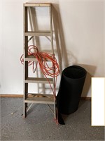 Ladder, extension cord, and doormat