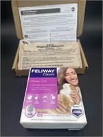 Heating pad and feliway cat calming and comfort
