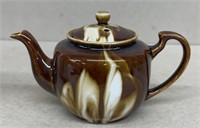 Chocolate caramel colored teapot