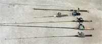 Lot of fishing poles and reels