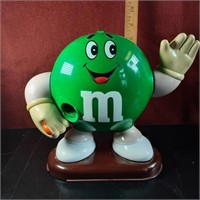 Green M&M candy dispenser