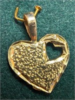 $400 10K  1.1G Heart Pendant