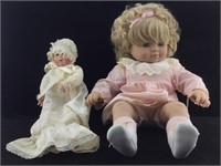 Bavarian godchild gift doll and baby doll.