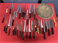 Large lot of knives & pizza stone