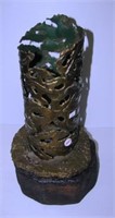 Brass Art Works decorative brass vase on wood