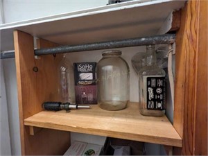 Contents of Closet: Jar, Phones, Dispenser