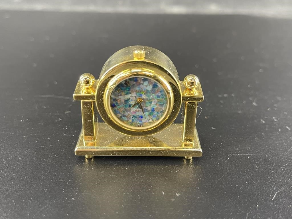 Miniature mantle clock with an opal mosaic face an