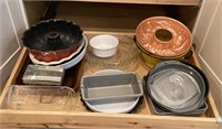 Contents of lower cabinet in kitchen