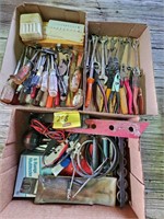 flat of screwdrivers, wrenches, pliers, allen