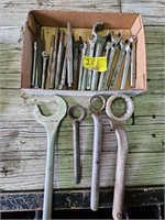 flat of specialty wrenches, drill bits, homemade
