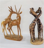 2 signed hand-carved wood animals