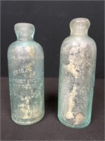 Two Hutchinson bottles embossed Chicago extract
