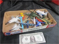 Box of toy jet planes & helicopters
