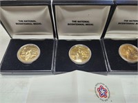 3 National bicentennial medals in display cases?