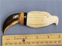 Very large bear claw, with fossilized ivory eagle