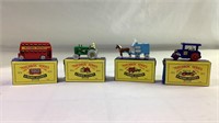 4 Diecast matchbox Series vehicles with boxes
