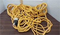 Yellow heavy duty extension cord.  At least 50ft i