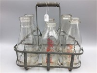 Vintage milk bottle carrier with bottles