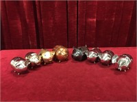 7 Metal Pig Banks & 1 Elephant Bank