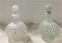 Clear and teal art glass bottles