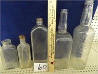 Vintage lot of clear bottles