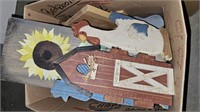 Box of wooden decor and wood craft cutouts