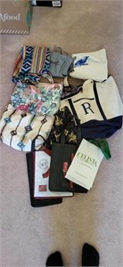 Group of reusable bags and aprons