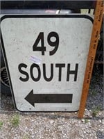 Metal 64 south sign