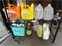 Two shelves cleaning supplies - Laundry detergent