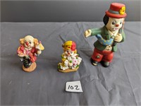 3 clown figures