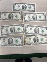 (7) two dollar bills